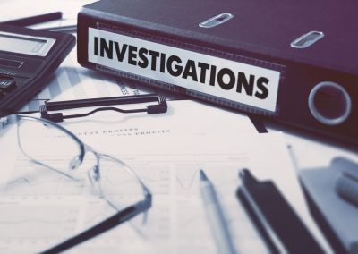 Ring Binder with inscription Investigations.